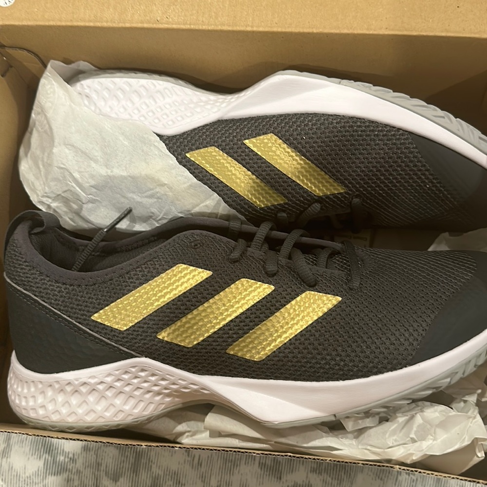 Never worn with tags, adidas women’s size 10 tennis shoe